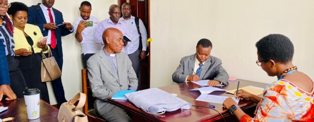 Officials from the MoFPED and MoLG) commissioning and handing over the IFMS equipment to the District. 